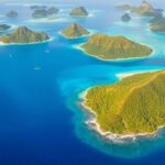 Aerial view of tropical islands and turquoise waters.