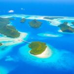 Aerial view of beautiful Tahiti islands with turquoise waters.