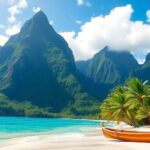 Tropical French Polynesia landscape with mountains, water, green foliage.