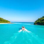 Tahiti island hopping, blue water, green mountains